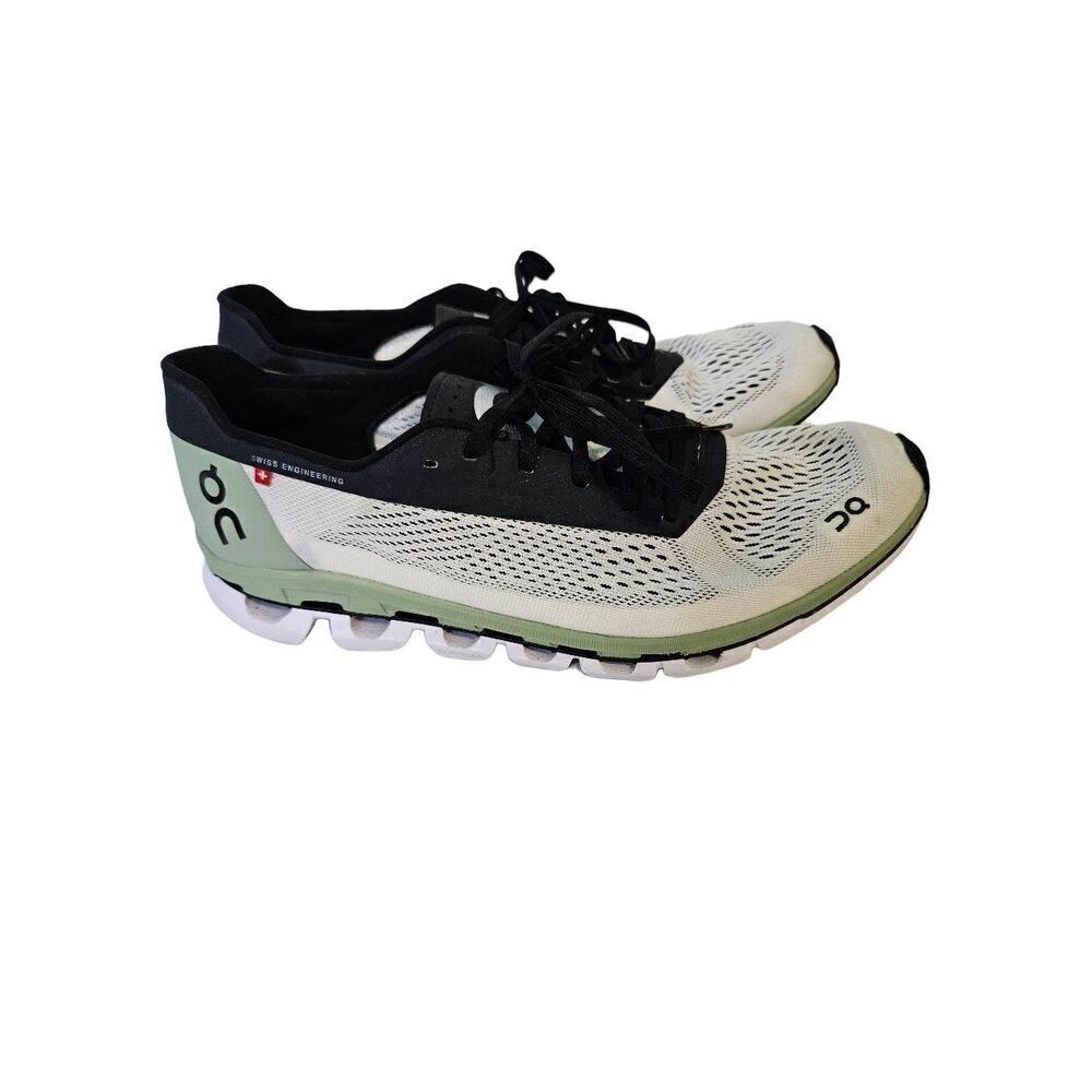 On Running On Cloud white, black and green running shoes. Size Women's 10.5.